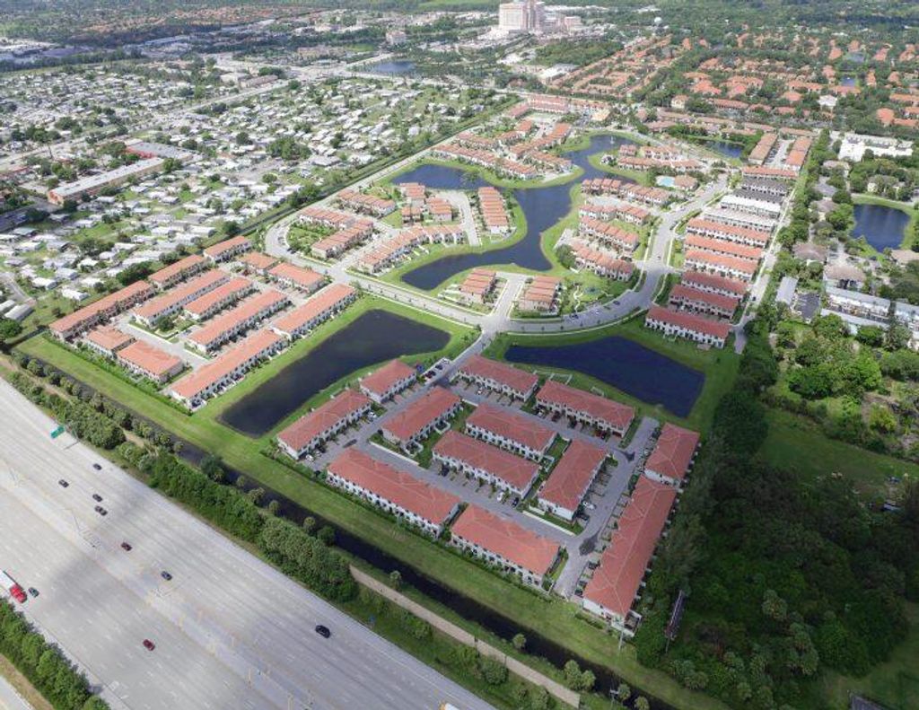 Photo of 4199 Napoli Lake Drive, Riviera Beach, FL 33410 (MLS # R10930704)