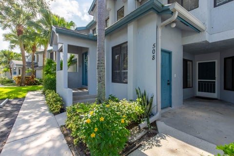 Photo of 508 Harbour Pointe Way, Greenacres, FL 33413 (MLS # B26050219)