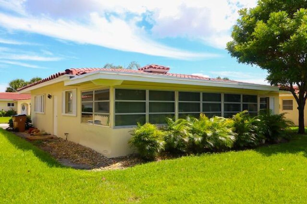 Photo of 4361 NW 12th Drive NW, Deerfield Beach, FL 33064 (MLS # R11148651)