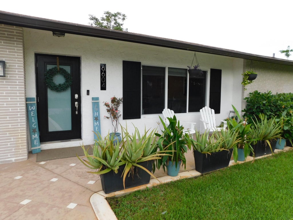 Photo of 6604 NW 93RD Avenue, Tamarac, FL 33321 (MLS # B26075731)