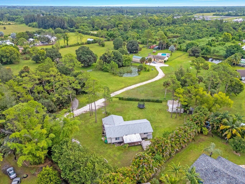 Photo of 14895 24TH Circle N, Loxahatchee Groves, FL 33470 (MLS # B26073966)