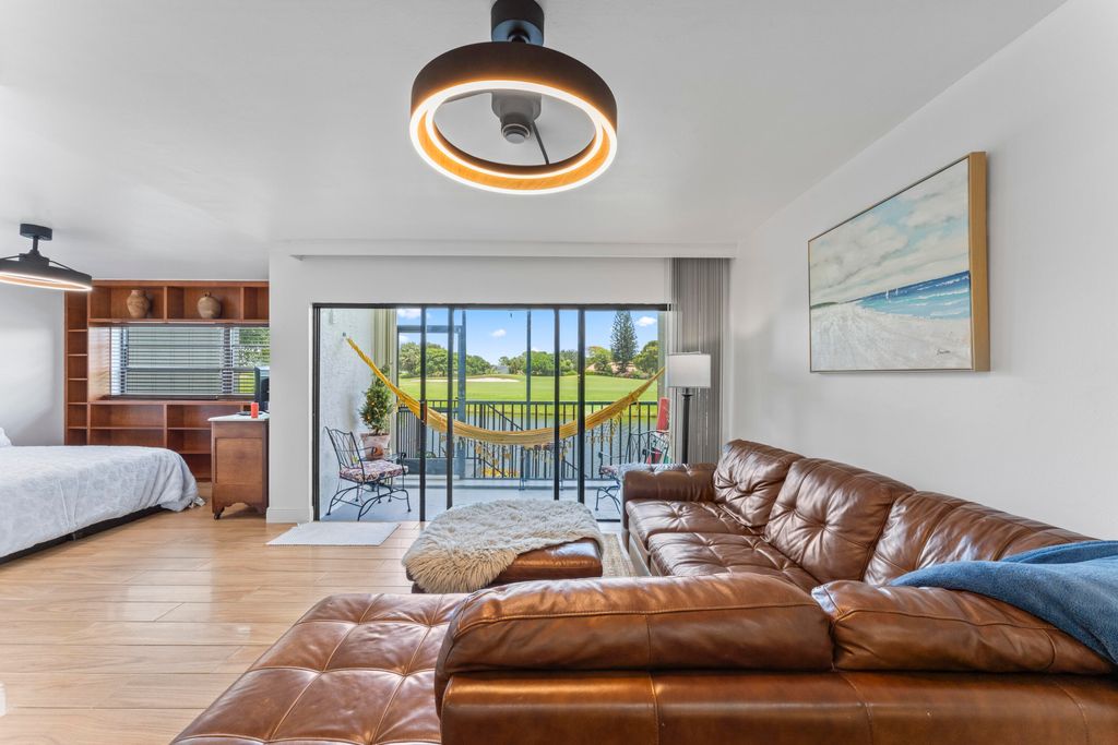 Photo of 551 Greensward Lane #102-D, Delray Beach, FL 33445 (MLS # R11111169)