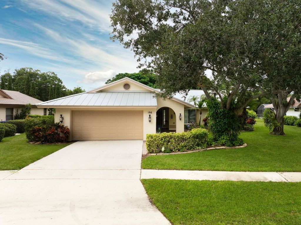 Photo of 166 Bayberry Circle, Jupiter, FL 33458 (MLS # R11101132)