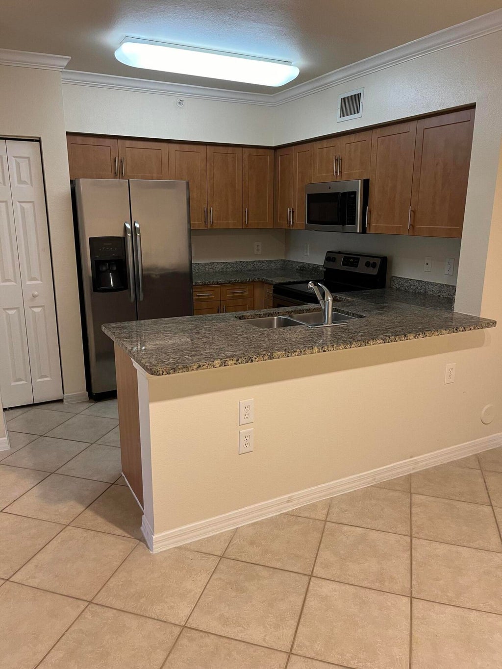 Photo of 6378 Emerald Dunes Drive #104, West Palm Beach, FL 33411 (MLS # R11042806)