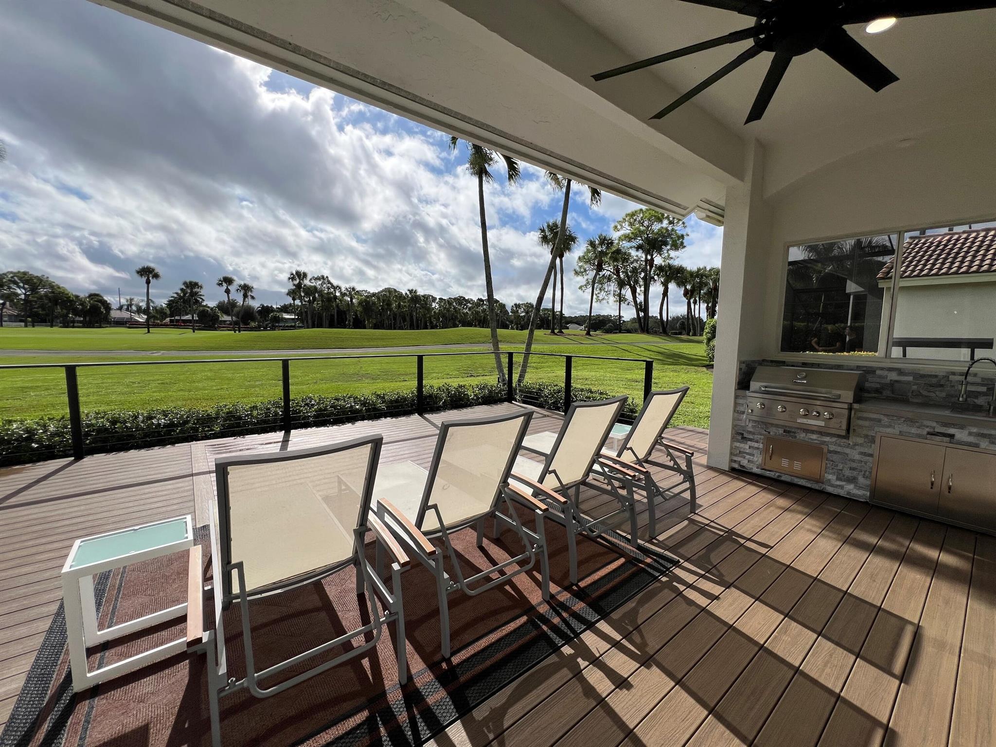 Welcome to your dream home in the golf course community of Ironhorse! This beautifully renovated one-story gem offers amazing golf course views of the 8th & 9th holes, a showstopping kitchen--brand new with top-of-the-line appliances, a huge quartz waterfall island with extra storage, & large pantry. Enjoy the cozy eat-in area or the patio with a summer kitchen, perfect for relaxing or entertaining. The open family room is bright and airy with impact sliders leading to fenced-in composite deck. The spacious owner's suite features a walk-in closet, gorgeous bathroom with dual sinks, soaking tub, & a sleek shower. Wood look tile floors throughout, new tile roof, new A/C, new water heater, a 2-car garage + golf cart garage, & 24/7 gated security. No mandatory membership--just great living.