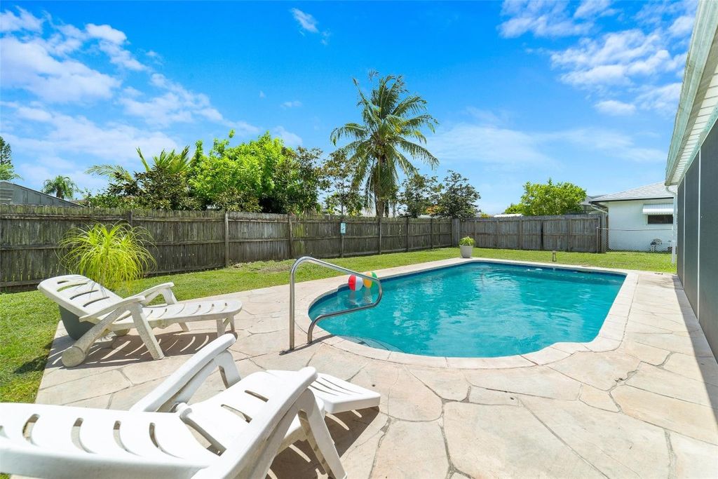 Photo of 4670 Betelnut Street, Boca Raton, FL 33428 (MLS # F10512693)