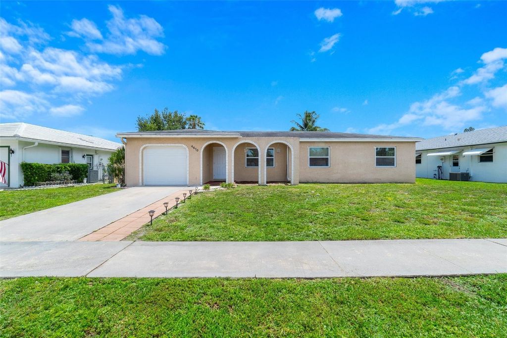 Photo of 4670 Betelnut Street, Boca Raton, FL 33428 (MLS # F10512693)