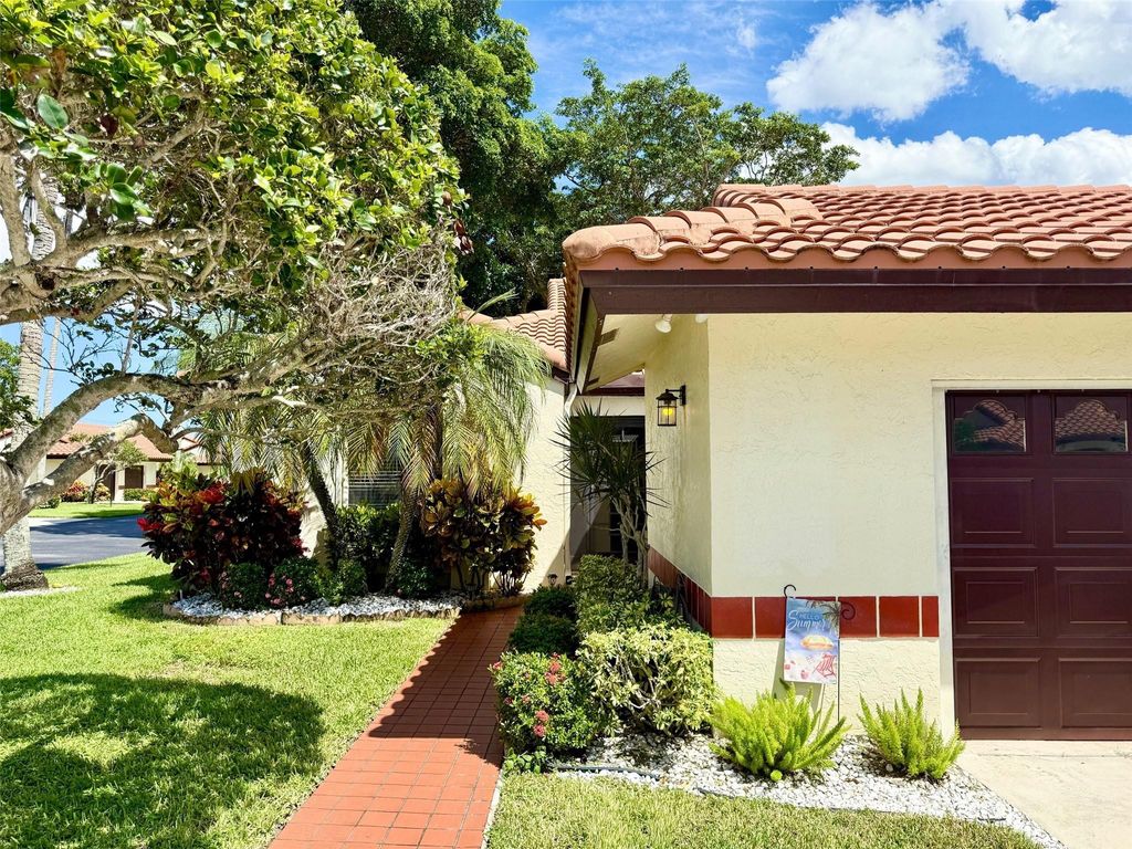 Photo of 5462 Palm Springs Lane #A, Boynton Beach, FL 33437 (MLS # B26023570)