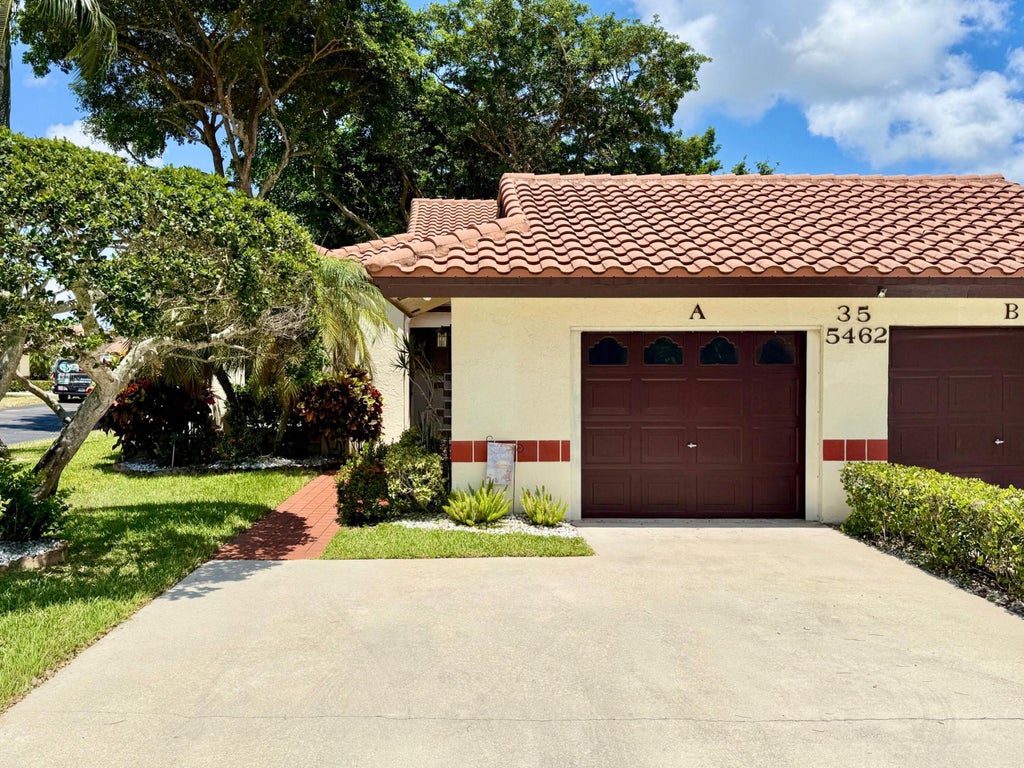 Photo of 5462 Palm Springs Lane #A, Boynton Beach, FL 33437 (MLS # B26023570)
