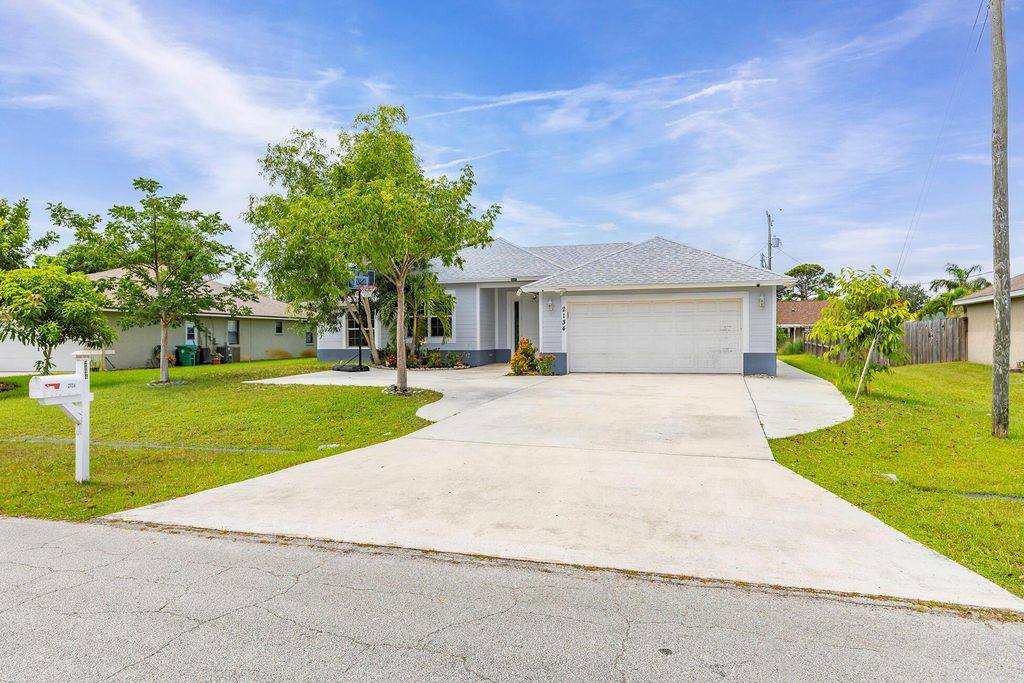 Photo of 2134 SE Bowie Street, Port Saint Lucie, FL 34952 (MLS # R11115519)