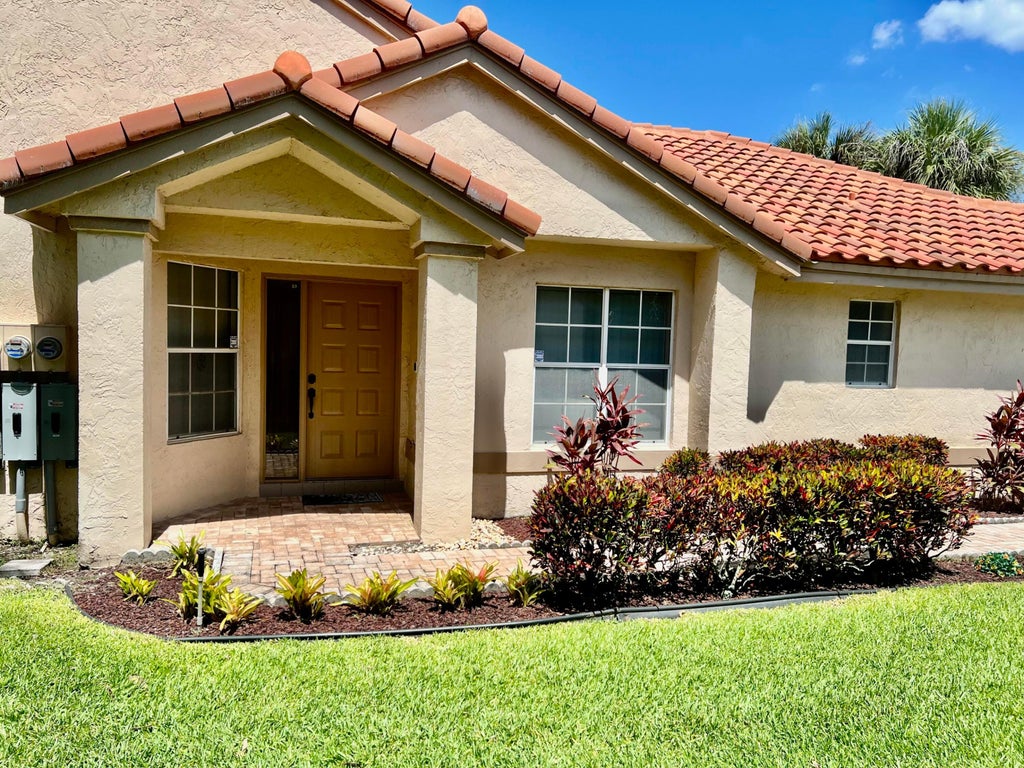 Photo of 10840 Cypress Glen Drive, Coral Springs, FL 33071 (MLS # B26044102)