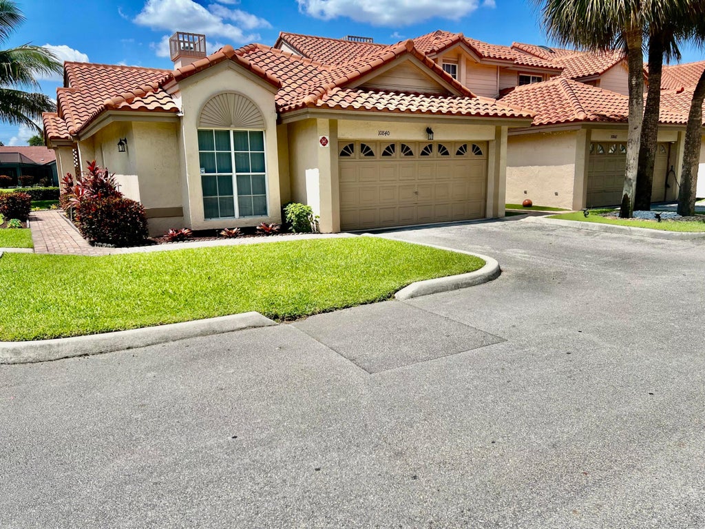 Photo of 10840 Cypress Glen Drive, Coral Springs, FL 33071 (MLS # B26044102)