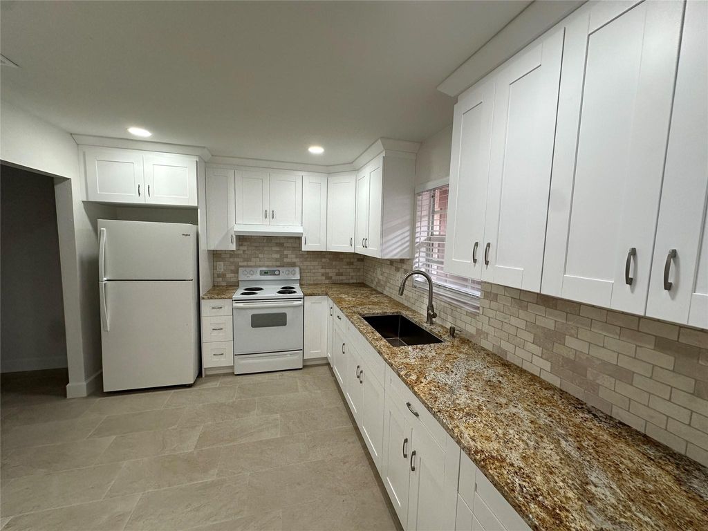 Photo of 3841 Riverside Drive #A, Coral Springs, FL 33065 (MLS # F10537543)