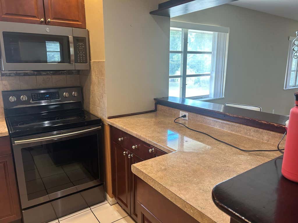 Photo of 3930 CRYSTAL LAKE Drive #316, Deerfield Beach, FL 33064 (MLS # B26064315)