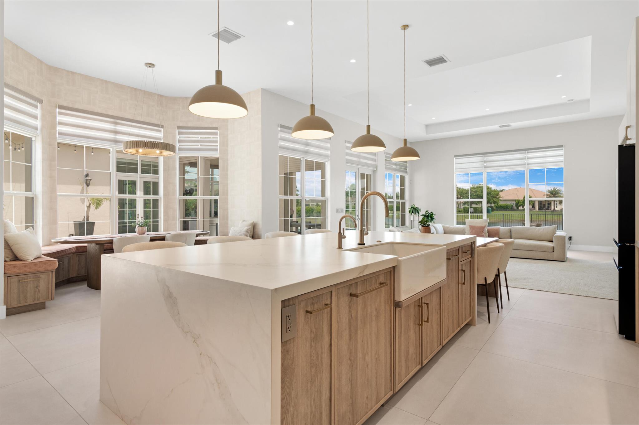 Discover an extraordinary residence in the highly sought-after Sterling Ranch community, offering effortless access to the Florida Turnpike. Spanning just under 5,000 sq. ft. of exquisitely remodeled living space, this 4-bedroom, 4.5-bathroom masterpiece blends timeless elegance with modern sophistication.The home boasts an expansive primary bedroom wing, soaring volume ceilings that flood the interiors with natural light, a formal dining and sitting room, dedicated office space, and a large laundry room, all enhanced by grand proportions and refined finishes. The open-concept living area is anchored by a gourmet chef's kitchen featuring a waterfall-edge porcelain island with generous seating, custom two-toned cabinetry, pot filler, induction stove, Cafe brand oven/microwave...