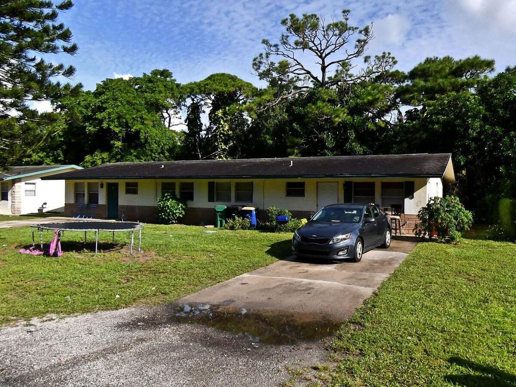 Photo of 906 N Lake N Drive #A, Fort Pierce, FL 34982 (MLS # R10916069)