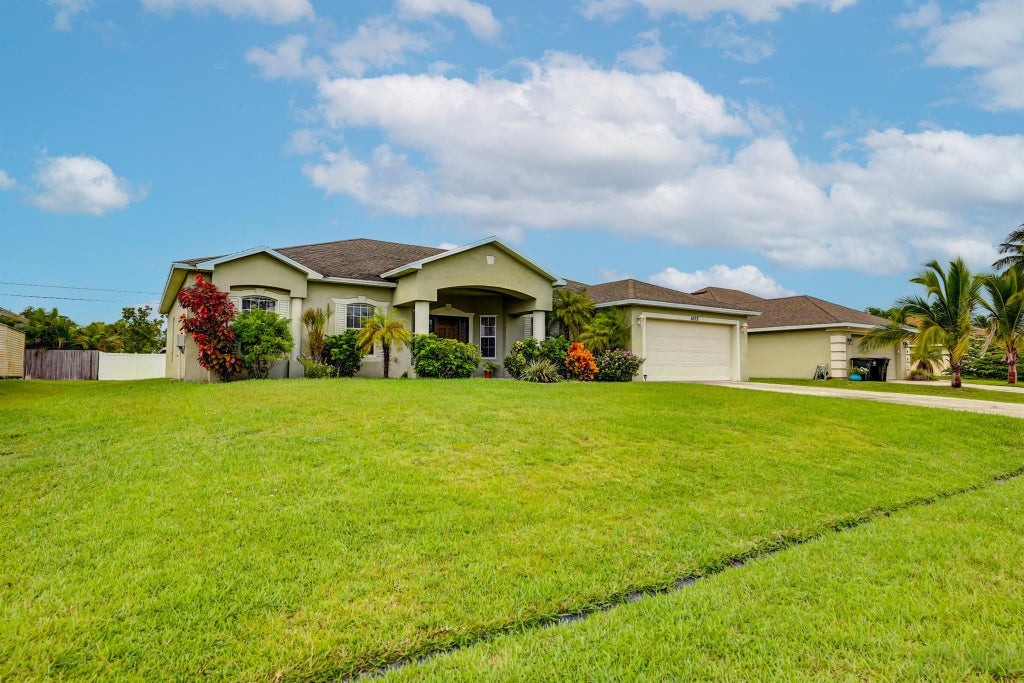 Photo of 1672 SW Realty Street, Port St Lucie, FL 34987 (MLS # R10921444)