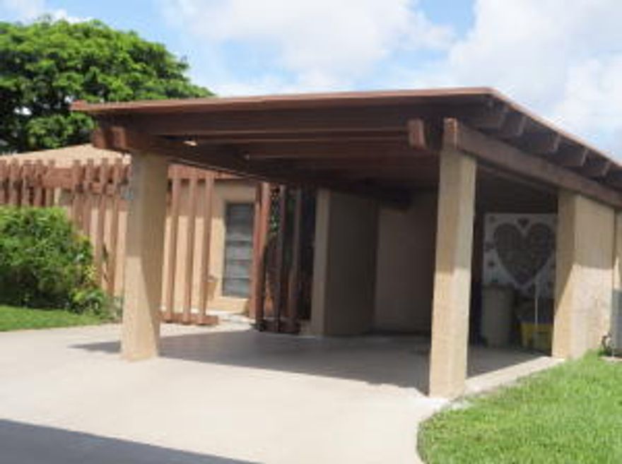 Shows like a model home...1 yr new gourmet granite countered eat-in kitchen with new tall hardwood cabinets and Brand-NEW Appliances.  ALL-TILED THROUGHOUT. Private covered parking and bonus outdoor storage room.  Private patio in front.  Washer/Dryer in kitchen closet. Lots of storage.  A true 3 bedroom villa plus an extra den area past the living room.  The nicest rental in the area!