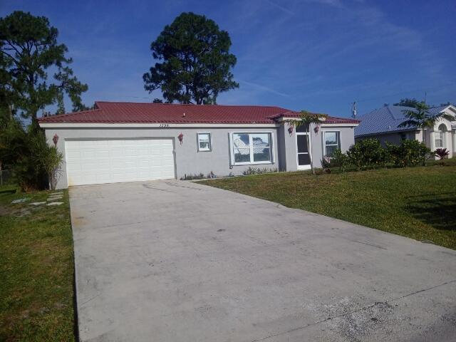 Photo of 1758 SW Southworth Terrace, Port Saint Lucie, FL 34953 (MLS # R10720250)