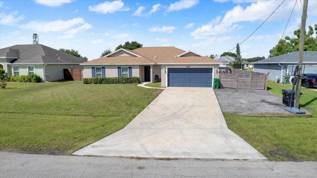 Photo of 5263 NW East Delwood Drive, Port Saint Lucie, FL 34986 (MLS # B26069303)
