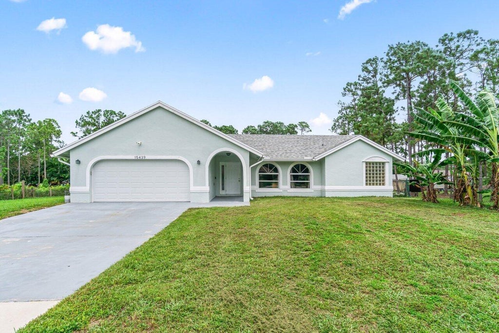 Photo of 15439 63rd Place N, Loxahatchee, FL 33470 (MLS # B26069294)