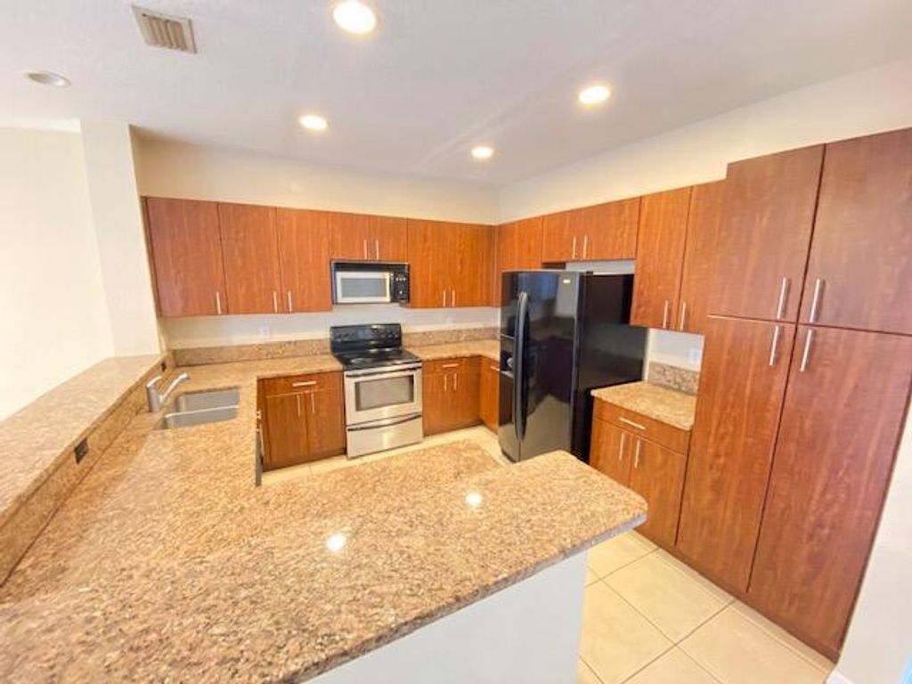 Photo of 6280 S Military Trail Trl #604, Lake Worth Beach, FL 33463 (MLS # R10764400)