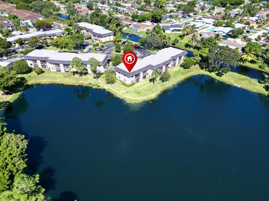 Move-in Ready OR Rent from Day One--making this a great investment! Don't miss this rare chance to own a bright, quiet corner residence with 180-degree water views from nearly every window--truly one of the most desirable outlooks in Pine Lake. Recent upgrades include impact windows and sliders for peace of mind, energy efficiency, and lower insurance costs. Inside you'll find a modernized kitchen with freshly painted cabinets & stainless appliances, refreshed baths/plumbing, Just installed carpets, full-size washer/dryer ('24), and a freshly painted interior with a new front door. Comfort is maximized with a A/C system Reem Halo air purification & new water heater ('21). The building already has a new roof approved with no assessment. 1 YR HOME WARRANTY INCLUDED! Low Condo Fee $443/Month