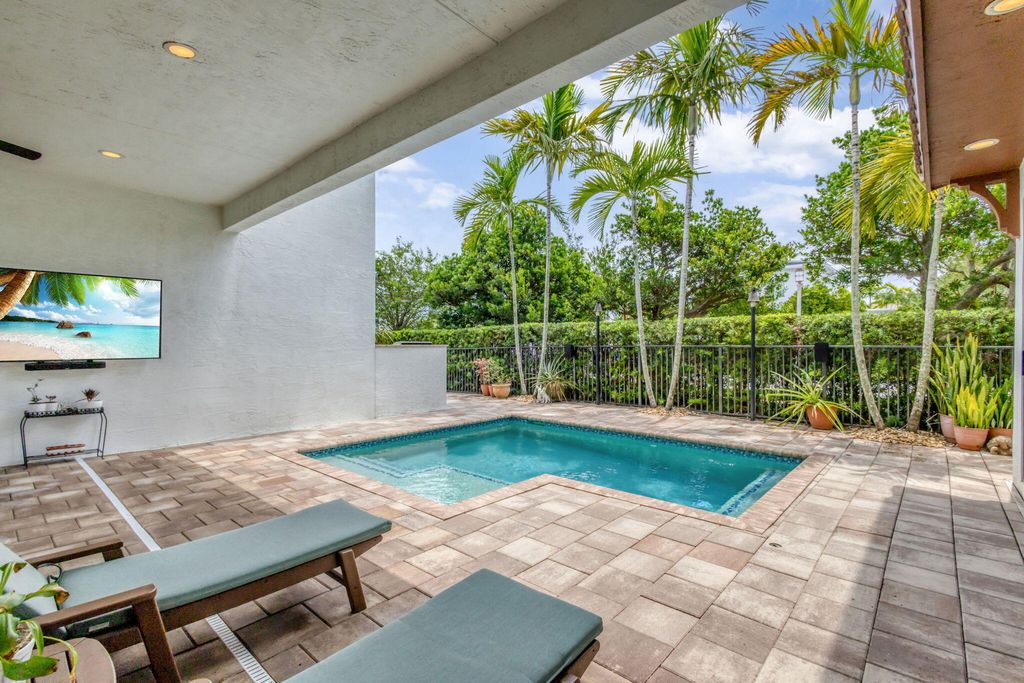 Photo of 5041 Grandiflora Road, Palm Beach Gardens, FL 33418 (MLS # R11102674)