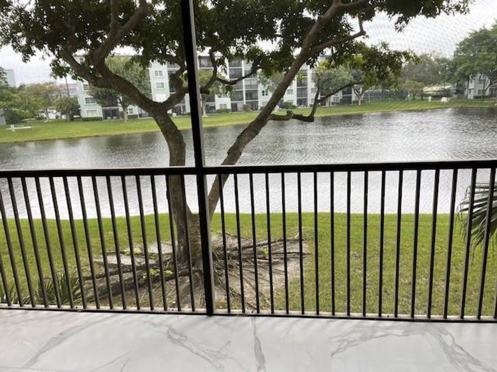 Photo of 2215 Cypress Island Drive #206, Pompano Beach, FL 33069 (MLS # B26023947)