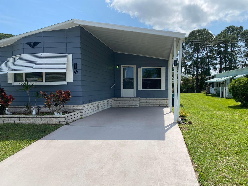 Photo of 45 Vista De Laguna, Fort Pierce, FL 34951 (MLS # R10967457)