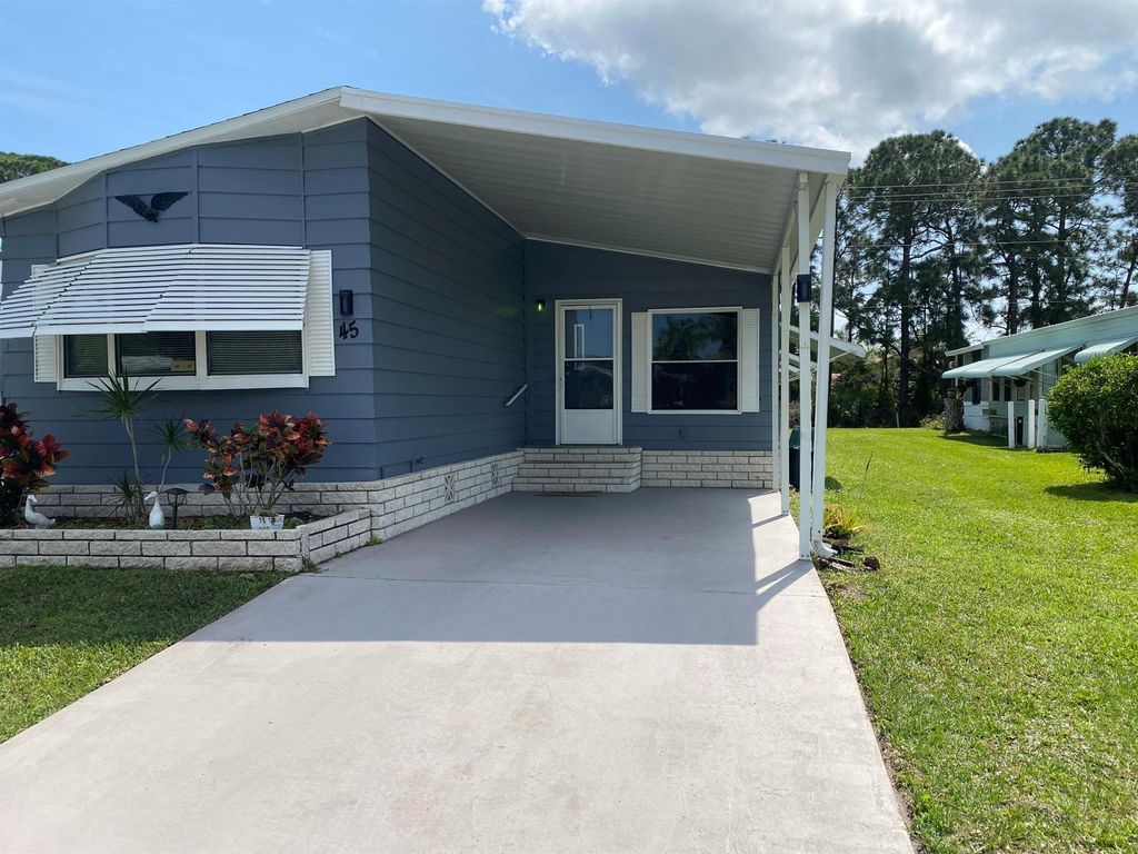 Photo of 45 Vista De Laguna, Fort Pierce, FL 34951 (MLS # R10967457)