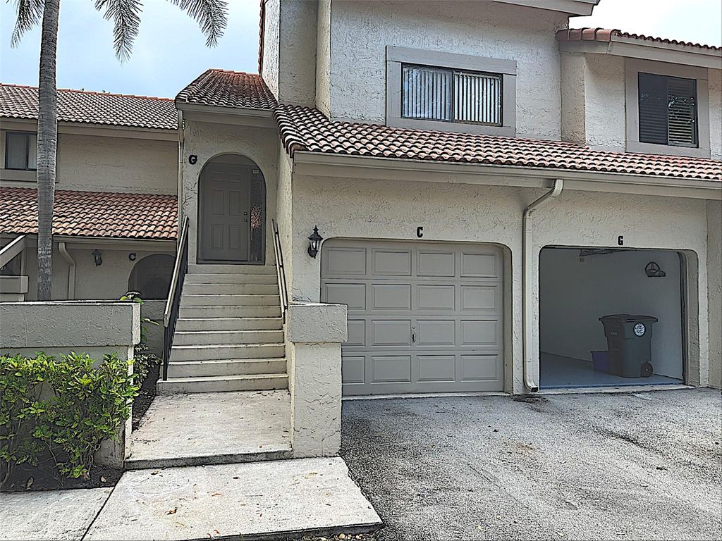 Photo of 5710 Coach House Cir #G, Boca Raton, FL 33486 (MLS # F10528014)