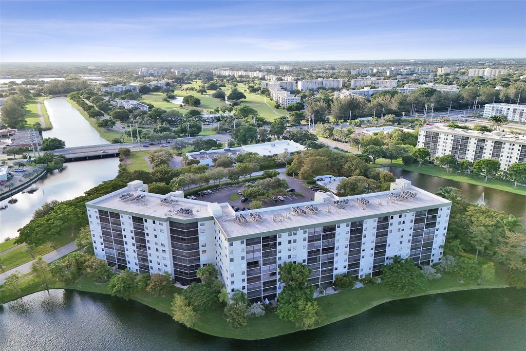 Photo of 2334 S Cypress Bend Dr #304, Pompano Beach, FL 33069 (MLS # F10533131)