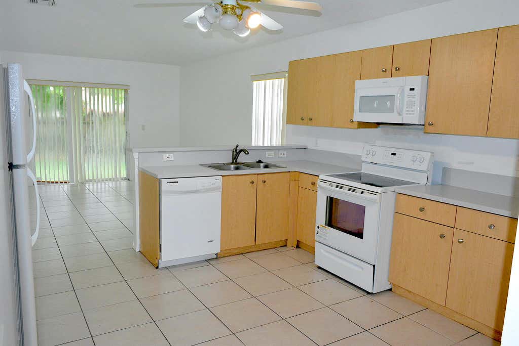 Photo of 1018 Park Hill Drive, Haverhill, FL 33417 (MLS # R11125200)