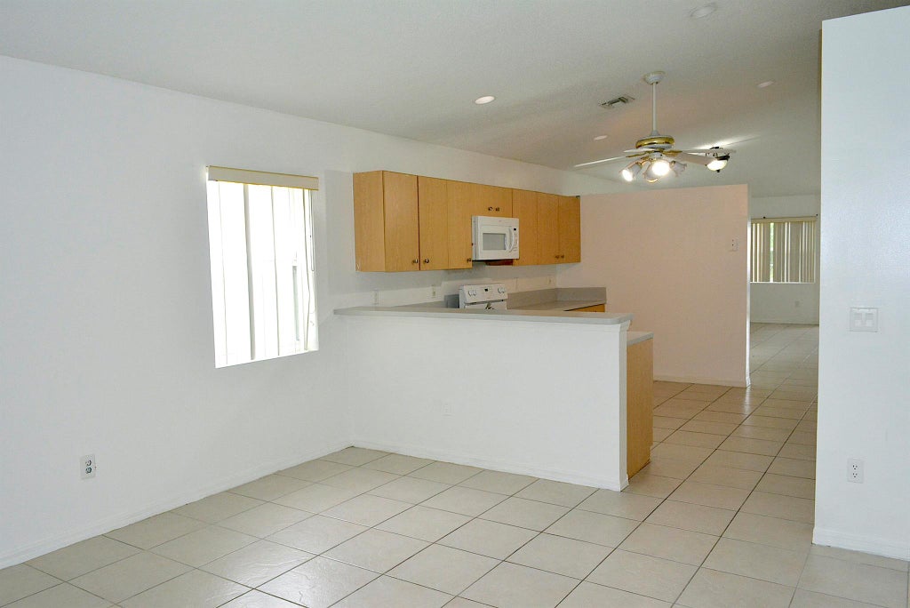 Photo of 1018 Park Hill Drive, Haverhill, FL 33417 (MLS # R11125200)