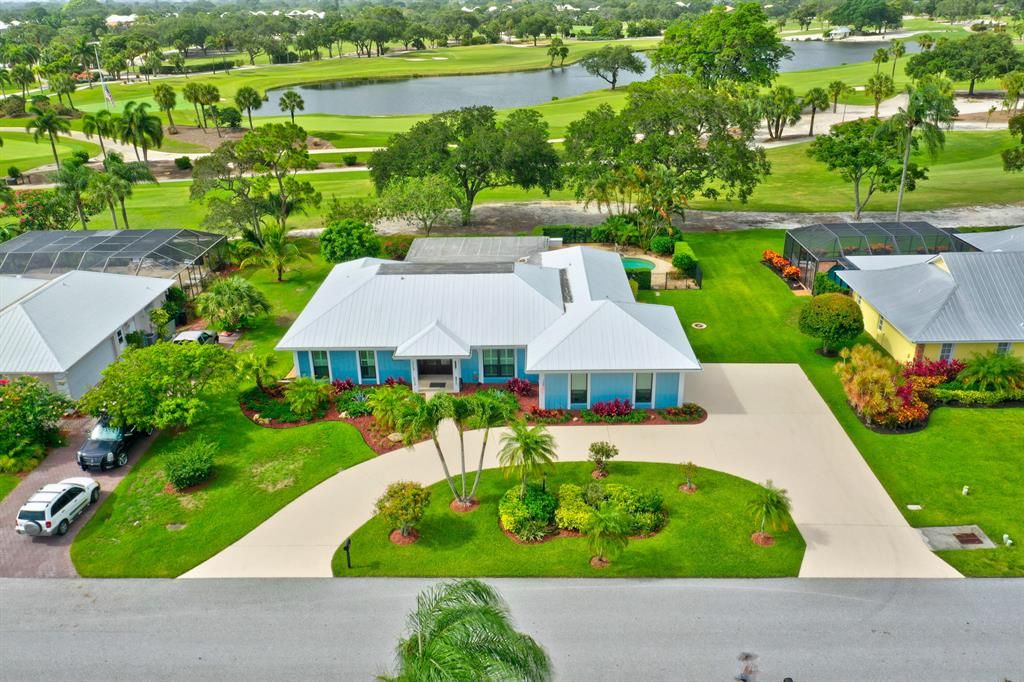 Photo of 24 SE Turtle Creek Drive, Tequesta, FL 33469 (MLS # R10725693)