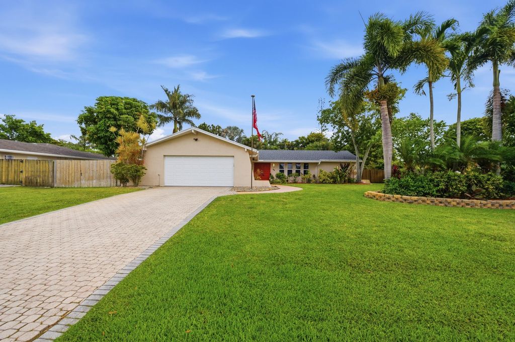 Photo of 55 W Cypress Road, Lake Worth, FL 33467 (MLS # B26033943)
