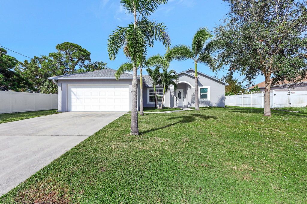 Photo of 457 SW Todd Avenue, Port Saint Lucie, FL 34983 (MLS # B26019333)