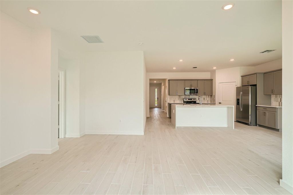 Photo of 1978 NE Ocean Dunes Drive, Jensen Beach, FL 34957 (MLS # R10935553)