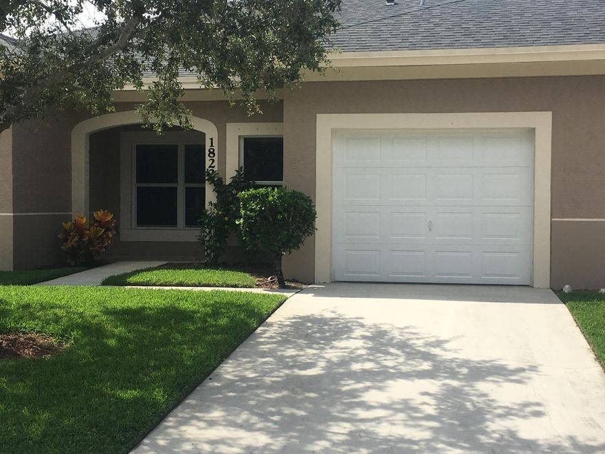 Start living the easy life in this 2 bed, 2 bath condo with a garage located right next to the heated pool.  You can tell this place has been well cared for.  Extremely clean, and is just waiting for your personal touch!  This condo is also in a rare 3 unit building, so there is no one living above you!  High ceilings throughout, newer laminate flooring in the living area, with newer carpet in both bedrooms.