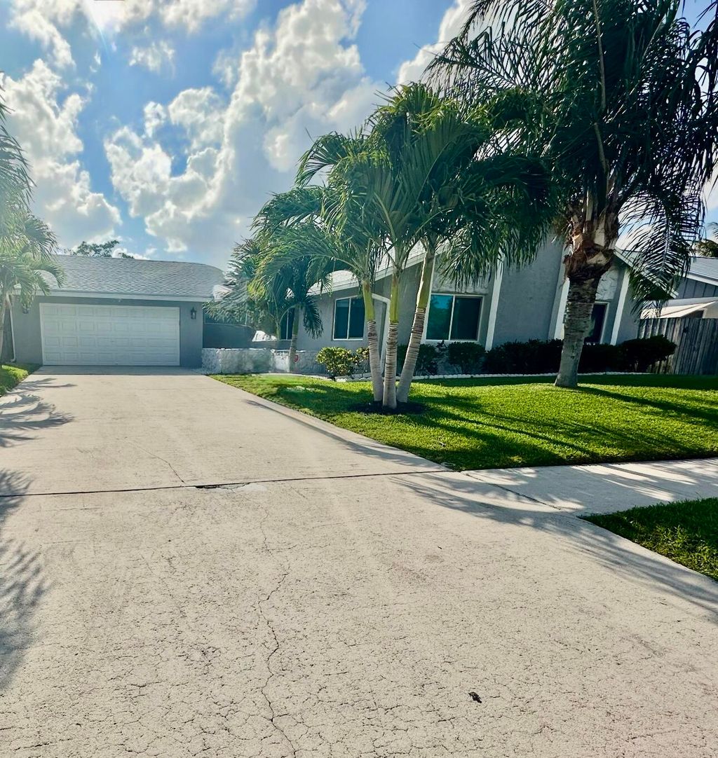 Photo of 605 Toxaway Drive, West Palm Beach, FL 33413 (MLS # B26021803)