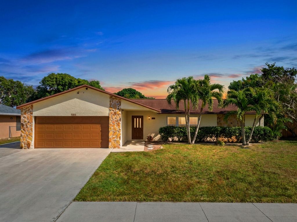 Photo of 150 Valencia Street, Royal Palm Beach, FL 33411 (MLS # R11160790)