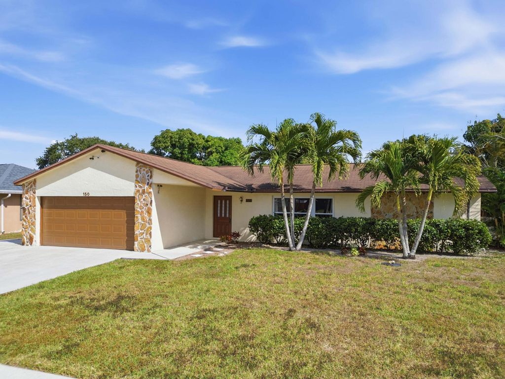 Photo of 150 Valencia Street, Royal Palm Beach, FL 33411 (MLS # R11160790)