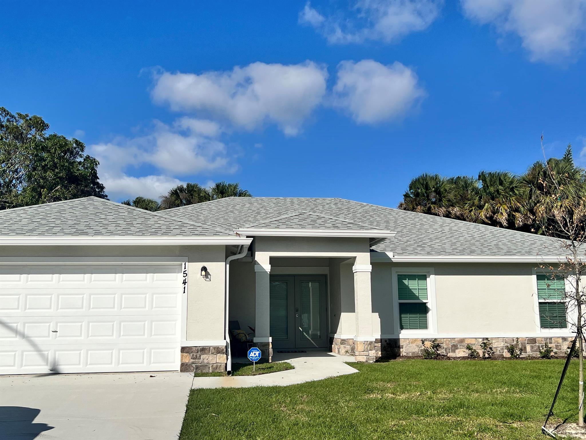 This spacious, brand new 4 bedroom, 2 bath home comes fully equipped with stainless appliances in the gourmet kitchen, brand new tile throughout, covered back patio, and beautiful finishes in both bathrooms. Master bedroom comes with his and hers walk-in closets. Don't miss your opportunity to rent your little piece of Paradise!