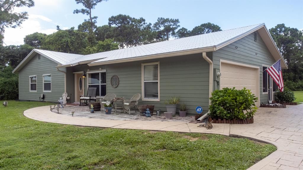 Photo of 5580 SE Meadow Springs Boulevard, Stuart, FL 34997 (MLS # R10834670)