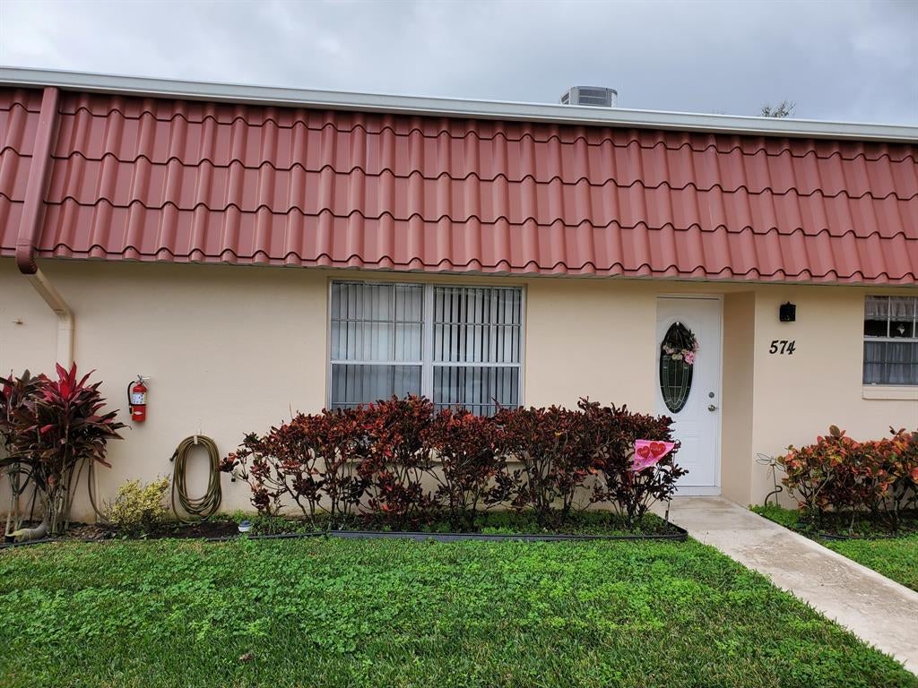 Photo of 574 Laconia Circle, Lake Worth, FL 33467 (MLS # R10688056)