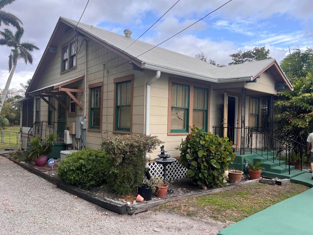 Photo of 1947 Bacom Point Road, Pahokee, FL 33476 (MLS # R11098457)