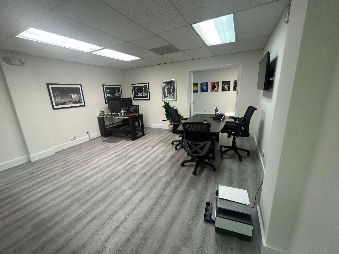 Two-room office. 590 sf. First room is very large with space for multiple desks and/or seating areas. Second can accommodate a more private office. Two entrances. One from main hall of building goes into waiting room and second entrance goes directly from parking lot to the private office. Two designated parking spots are right outside that private entrance, plus plenty of additional general parking spaces. Suite always includes a storage room. Electricity and AC included in rent price.