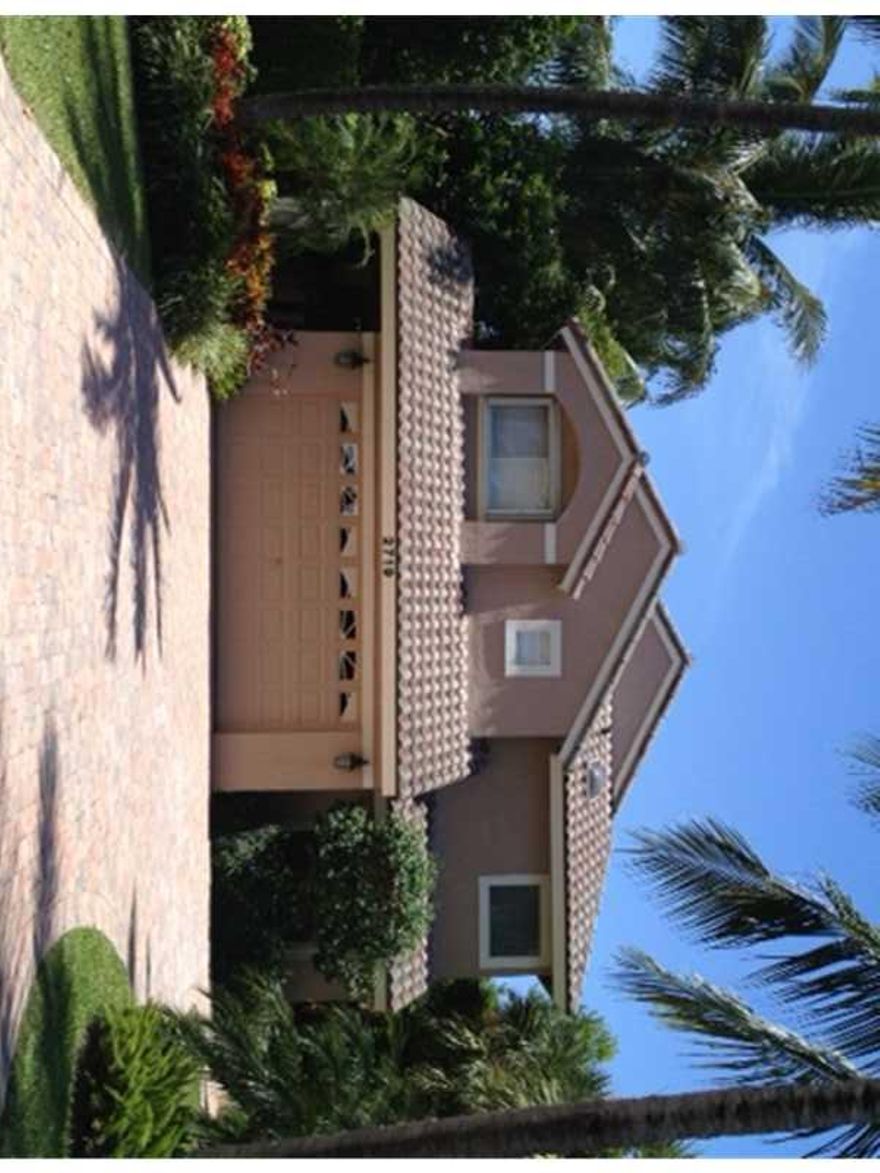 Everything has been redone in this gorgeous home located in the Marina area of Lighthouse Point, including baths, closets, skylights, kitchen, floors, lighting, and window treatments.  Large master suite with 2 closets, glamorous  bath, with tub and showe r. Charming office. Two car garage has beautiful floors and cabinetry. Home fully landscaped for beauty and privacy. There is room for small pool.  Lighthouse Point has its  own fire and police departments, public library and shopping.