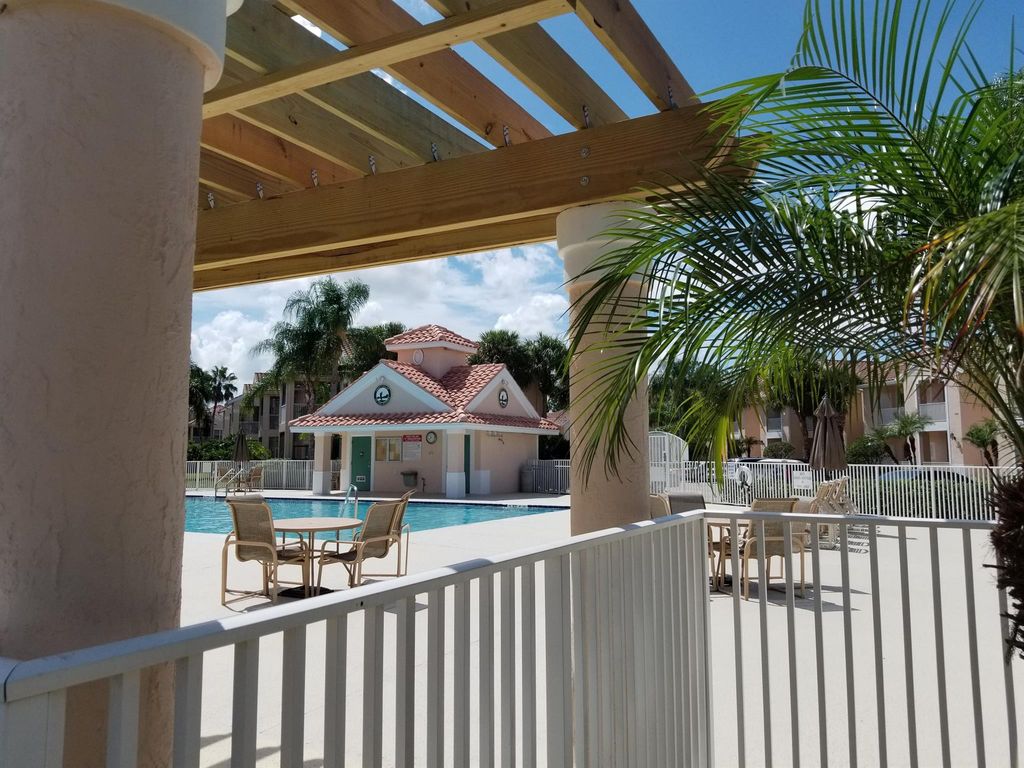 Photo of 9923 Perfect Drive #G, Port Saint Lucie, FL 34986 (MLS # R10989121)